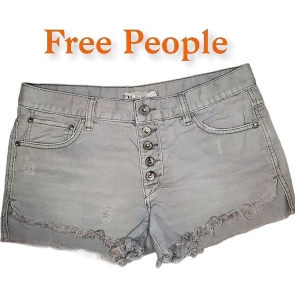 Free People Rugged Ripped Denim Shark Bite Shorts - Picture 2 of 13